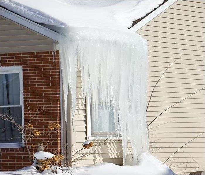 Icicles hanging from gutter